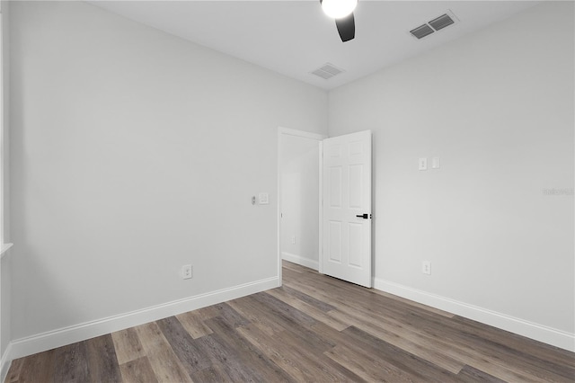 4447 Heyward St, North Port, FL 34291 - unfurnished room with a ceiling fan and dark wood finished floors