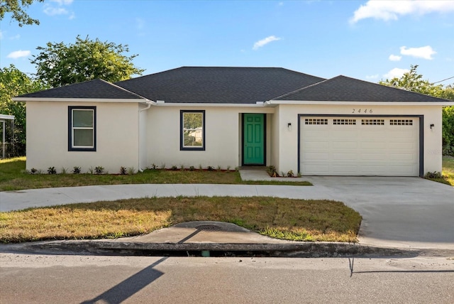 2446 Greenway, Sanford, FL 32771 - ranch-style home with stucco siding, driveway, an attached garage, and a front lawn