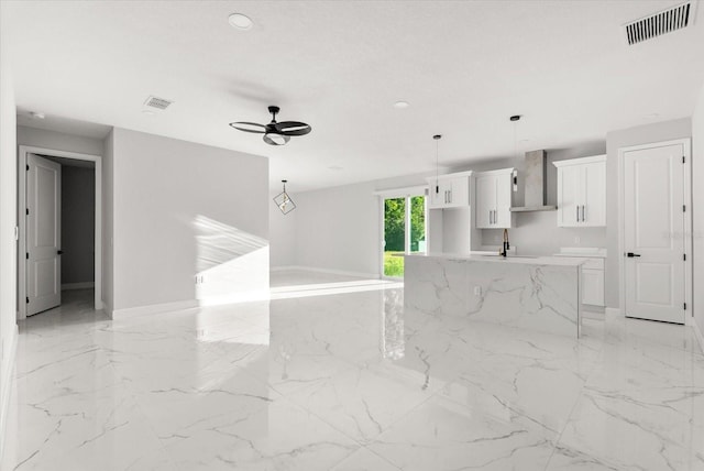 2446 Greenway, Sanford, FL 32771 - unfurnished living room with a ceiling fan, light marble finish flooring, and recessed lighting