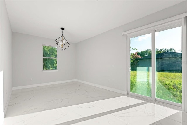 2446 Greenway, Sanford, FL 32771 - empty room with marble tiled flooring and baseboards