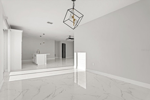 2446 Greenway, Sanford, FL 32771 - spare room with light marble finish floors and ceiling fan