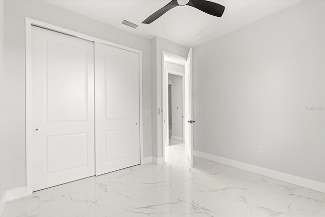 2446 Greenway, Sanford, FL 32771 - unfurnished bedroom with marble finish floors, a closet, and ceiling fan