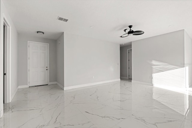 2446 Greenway, Sanford, FL 32771 - unfurnished room with marble tiled floors and ceiling fan