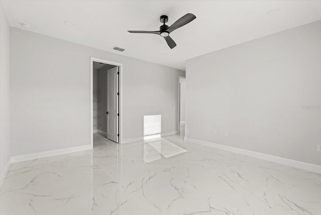 2446 Greenway, Sanford, FL 32771 - empty room with light marble finish flooring and a ceiling fan