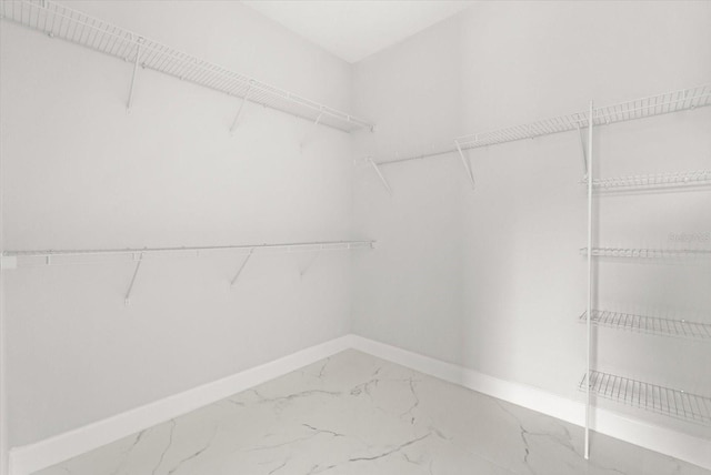 2446 Greenway, Sanford, FL 32771 - walk in closet with marble look tile flooring