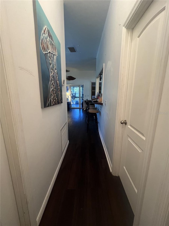 3767 Hibiscus St, Big Pine Key, FL 33043 - hallway with wood finished floors and baseboards
