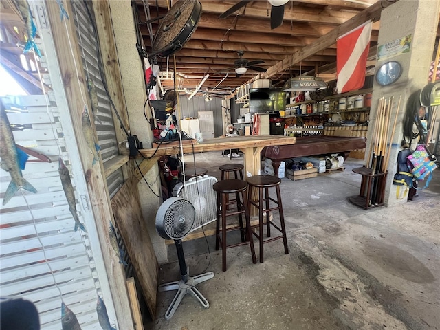 3767 Hibiscus St, Big Pine Key, FL 33043 - bar featuring concrete flooring and a workshop area