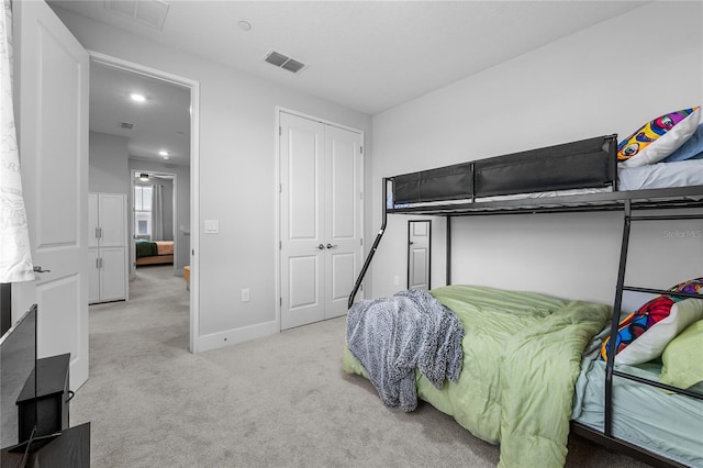 8427 Modiano St, Orlando, FL 32827 - carpeted bedroom with baseboards and a closet