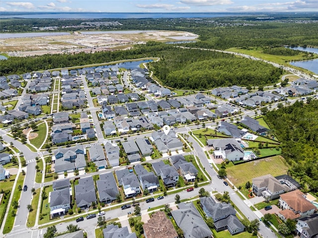 8427 Modiano St, Orlando, FL 32827 - aerial overview of property's location with a nearby body of water and nearby suburban area
