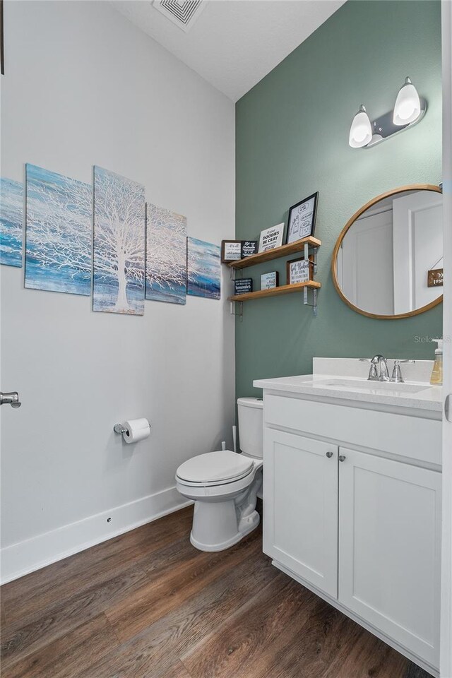 8427 Modiano St, Orlando, FL 32827 - half bath featuring wood finished floors and vanity