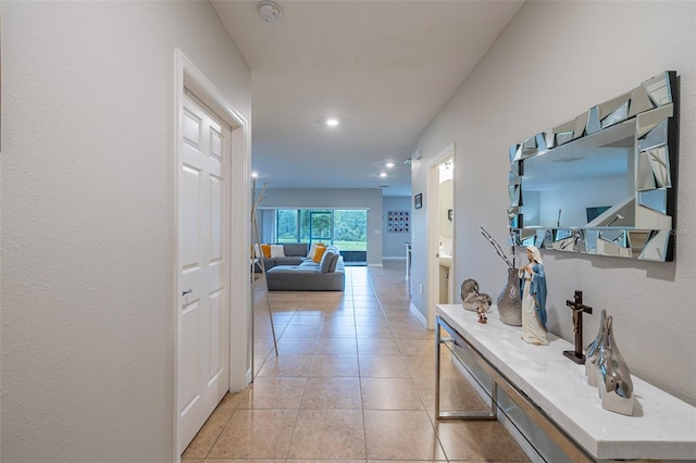 565 Ogelthorpe Dr, Davenport, FL 33897 - hallway featuring light tile patterned floors and recessed lighting