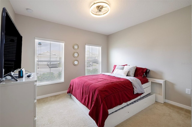 565 Ogelthorpe Dr, Davenport, FL 33897 - bedroom with light colored carpet and baseboards