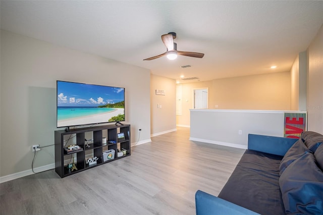565 Ogelthorpe Dr, Davenport, FL 33897 - living room with wood finished floors and a ceiling fan
