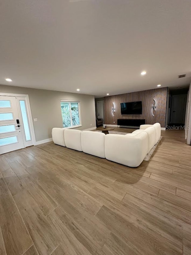 213 W Tilden St, Winter Garden, FL 34787 - living room with recessed lighting and light wood-type flooring