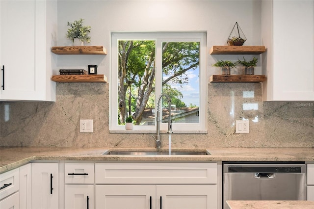 213 W Tilden St, Winter Garden, FL 34787 - kitchen featuring open shelves, stainless steel dishwasher, and white cabinets