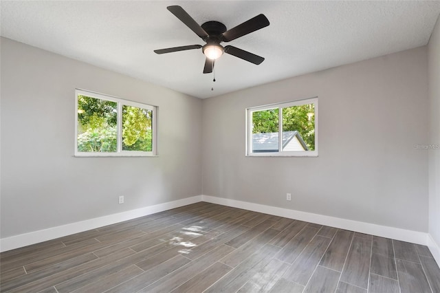 213 W Tilden St, Winter Garden, FL 34787 - empty room with wood finished floors and a ceiling fan