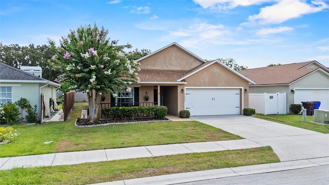 2980 Cool Breeze Cir, Saint Cloud, FL 34769 - ranch-style home featuring stucco siding, a garage, concrete driveway, and covered porch