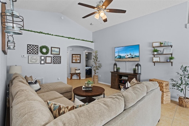 2980 Cool Breeze Cir, Saint Cloud, FL 34769 - living area featuring arched walkways, ceiling fan, light tile patterned floors, and high vaulted ceiling