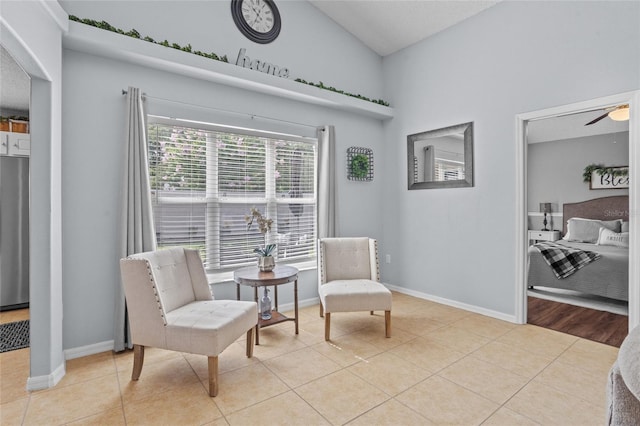 2980 Cool Breeze Cir, Saint Cloud, FL 34769 - living area with arched walkways, high vaulted ceiling, light tile patterned floors, and a ceiling fan