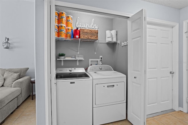 2980 Cool Breeze Cir, Saint Cloud, FL 34769 - washroom featuring independent washer and dryer and light tile patterned floors
