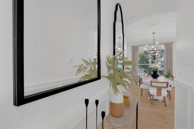 215 Foxglove Way, Deland, FL 32724 - detailed view of a chandelier and wood finished floors