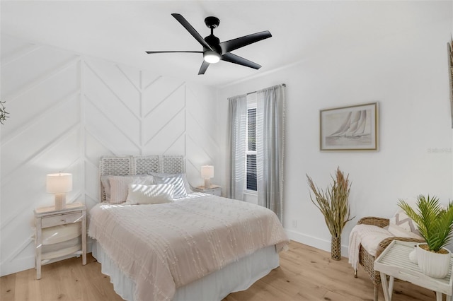 215 Foxglove Way, Deland, FL 32724 - bedroom with light wood-style floors and a ceiling fan