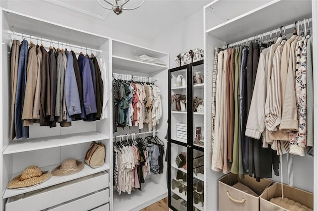 215 Foxglove Way, Deland, FL 32724 - spacious closet featuring wood finished floors