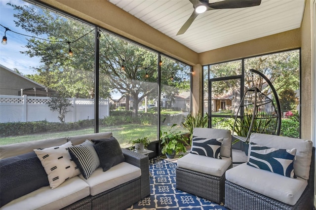 215 Foxglove Way, Deland, FL 32724 - sunroom featuring a ceiling fan and an outdoor living space