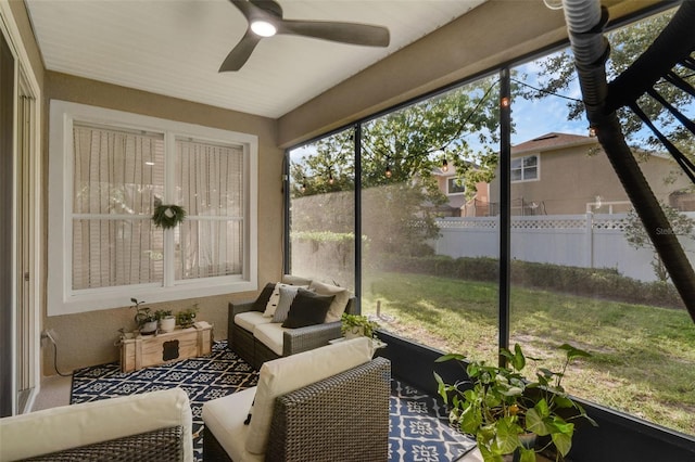 215 Foxglove Way, Deland, FL 32724 - sunroom with a ceiling fan and an outdoor hangout area