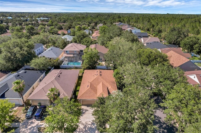 215 Foxglove Way, Deland, FL 32724 - aerial view of residential area featuring a heavily wooded area