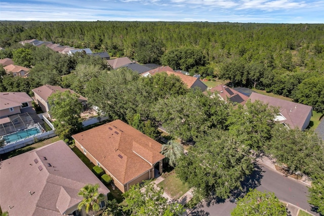 215 Foxglove Way, Deland, FL 32724 - aerial perspective of suburban area with a heavily wooded area