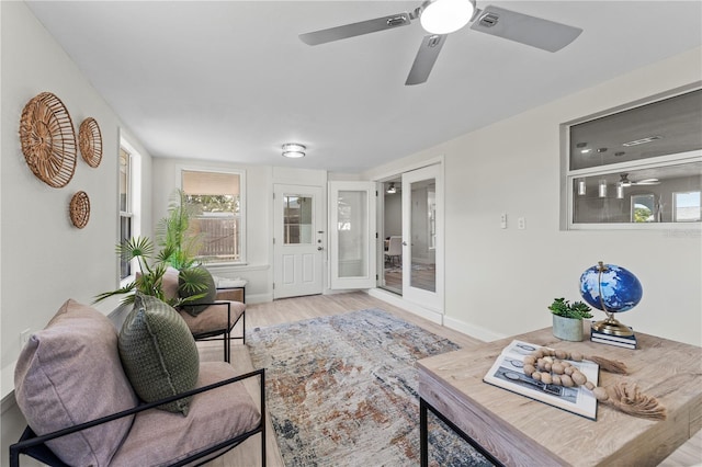 2075 Abalone Ave, Indialantic, FL 32903 - living area with a ceiling fan and wood finished floors