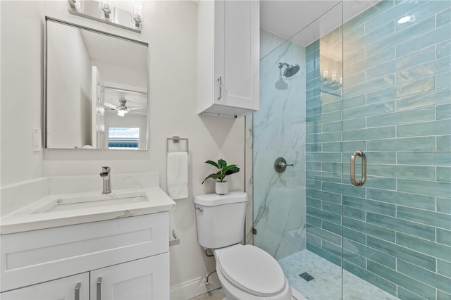 2075 Abalone Ave, Indialantic, FL 32903 - full bathroom featuring a stall shower, vanity, and a ceiling fan