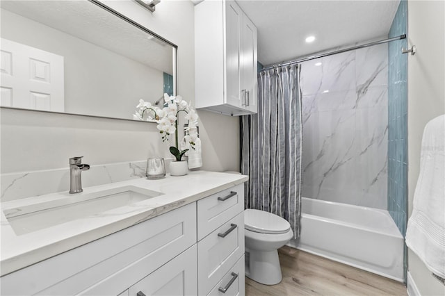 2075 Abalone Ave, Indialantic, FL 32903 - full bathroom with vanity, wood finished floors, shower / bath combo with shower curtain, and recessed lighting
