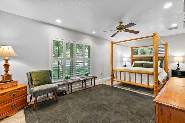 4230 Havana Dr, Cocoa, FL 32927 - bedroom with recessed lighting, a textured ceiling, and a ceiling fan