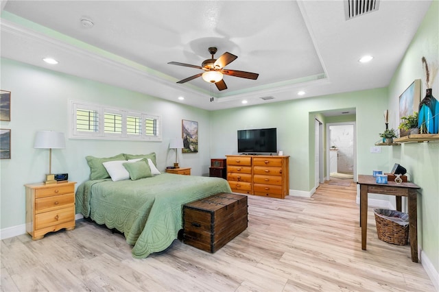 4230 Havana Dr, Cocoa, FL 32927 - bedroom featuring a tray ceiling, light wood finished floors, recessed lighting, and a ceiling fan