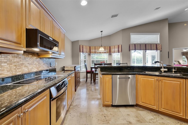 871 Paddington Ter, Lake Mary, FL 32746 - kitchen with oven, lofted ceiling, dishwasher, tasteful backsplash, and black electric stovetop
