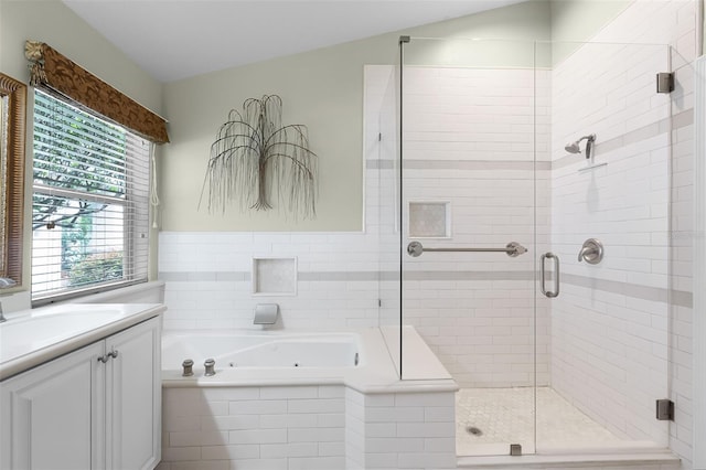 871 Paddington Ter, Lake Mary, FL 32746 - bathroom with a stall shower, a whirlpool tub, and vanity