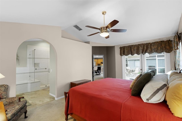 871 Paddington Ter, Lake Mary, FL 32746 - bedroom featuring arched walkways, vaulted ceiling, light carpet, ensuite bathroom, and ceiling fan