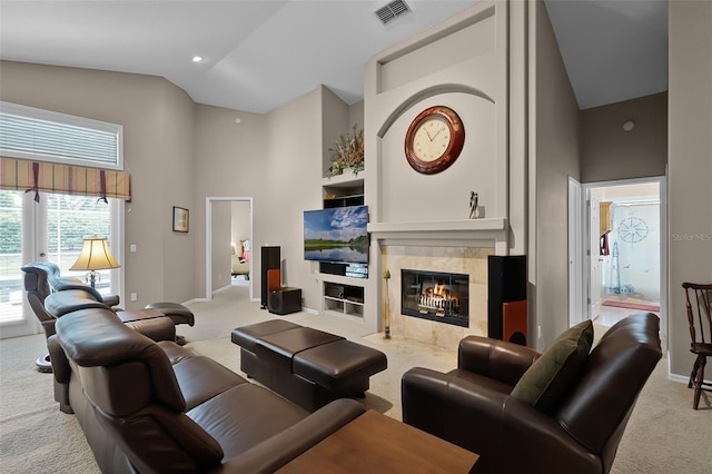 871 Paddington Ter, Lake Mary, FL 32746 - living area with carpet floors, high vaulted ceiling, and a high end fireplace