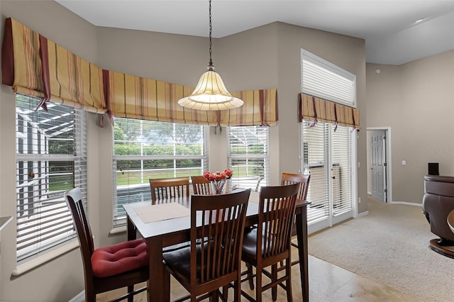 871 Paddington Ter, Lake Mary, FL 32746 - dining area with light carpet and baseboards