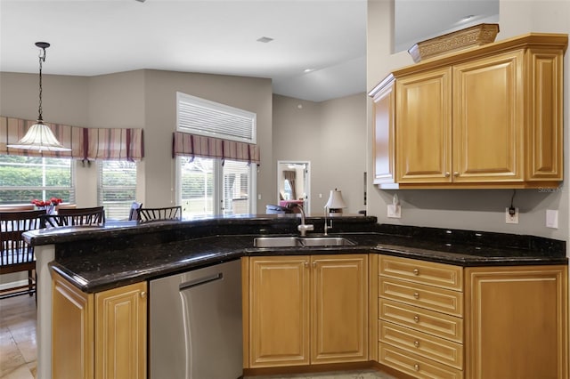 871 Paddington Ter, Lake Mary, FL 32746 - kitchen featuring stainless steel dishwasher, dark stone counters, pendant lighting, and a peninsula
