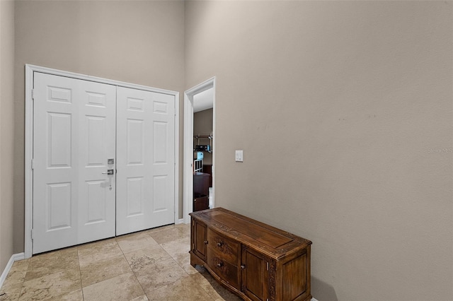 871 Paddington Ter, Lake Mary, FL 32746 - foyer featuring light stone finish floors and baseboards