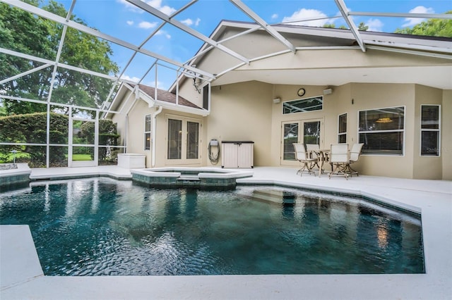 871 Paddington Ter, Lake Mary, FL 32746 - view of swimming pool with french doors, a patio, a pool with connected hot tub, and glass enclosure