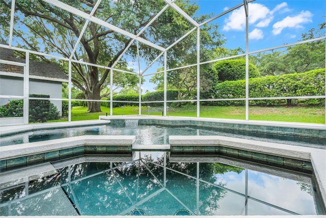 871 Paddington Ter, Lake Mary, FL 32746 - view of pool featuring glass enclosure, a pool with connected hot tub, and a lawn