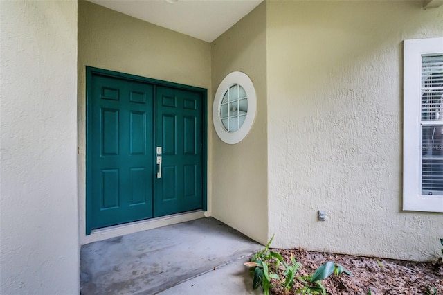 871 Paddington Ter, Lake Mary, FL 32746 - view of exterior entry with stucco siding