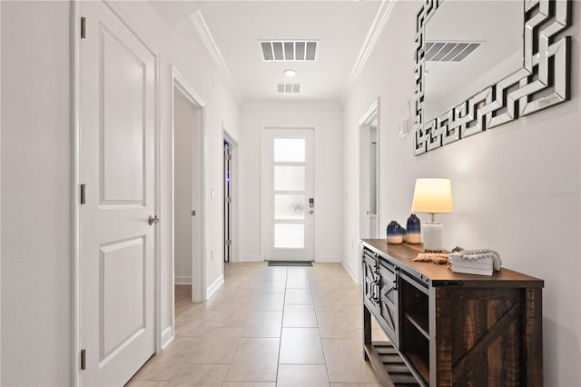 4185 Paragraph Dr, Kissimmee, FL 34746 - foyer with crown molding and light tile patterned floors