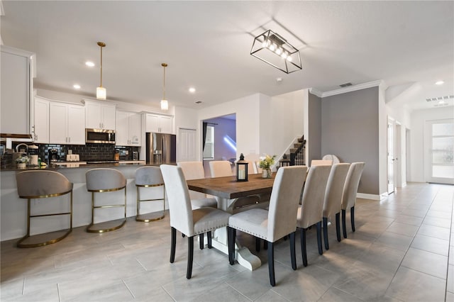 4185 Paragraph Dr, Kissimmee, FL 34746 - dining area featuring recessed lighting and light tile patterned floors