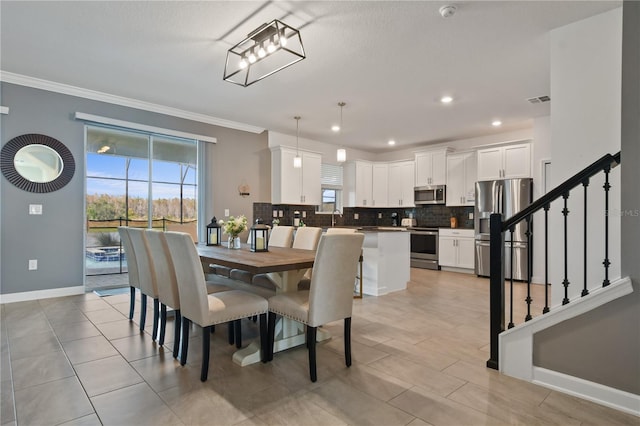 4185 Paragraph Dr, Kissimmee, FL 34746 - dining room with ornamental molding, stairway, recessed lighting, and light tile patterned flooring