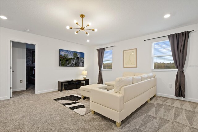 4185 Paragraph Dr, Kissimmee, FL 34746 - carpeted living room with a chandelier and recessed lighting